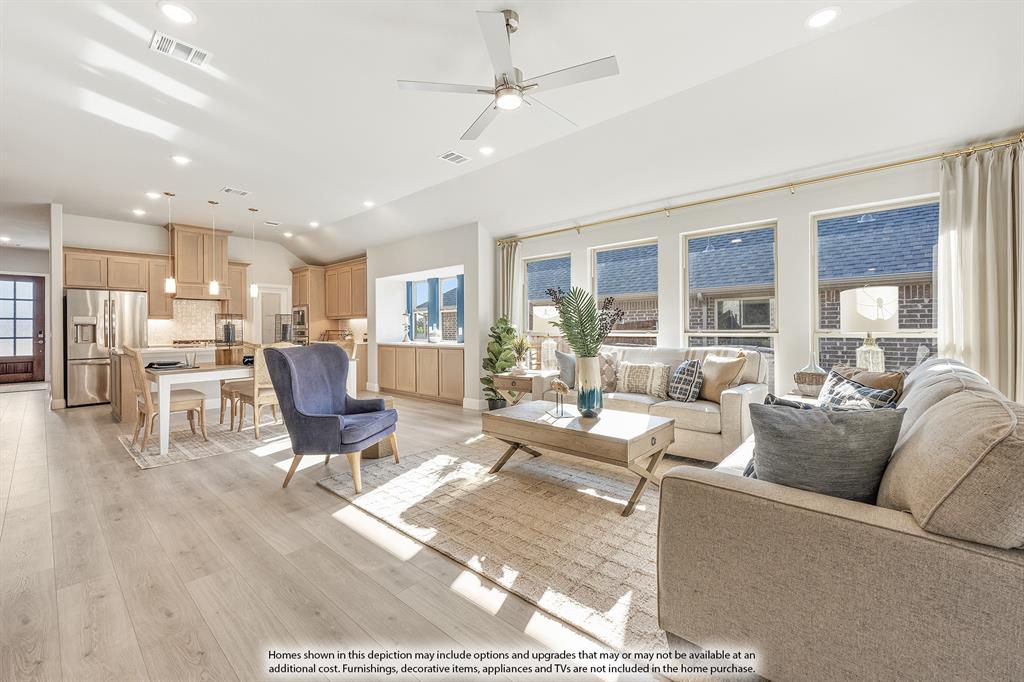 14550 Lovelace Street Pilot Point, TX 76258 - Photo 16 of 23 a living room with furniture and a table