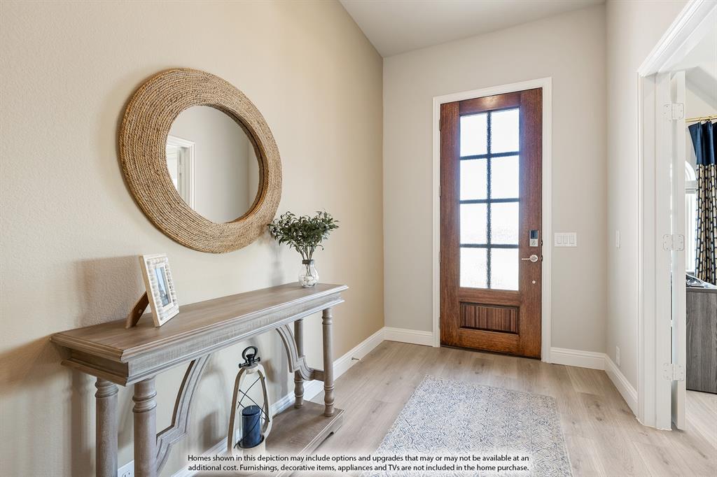 14550 Lovelace Street Pilot Point, TX 76258 - Photo 3 of 23 a view of a livingroom with furniture and windows