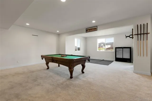 a room with furniture and a rug