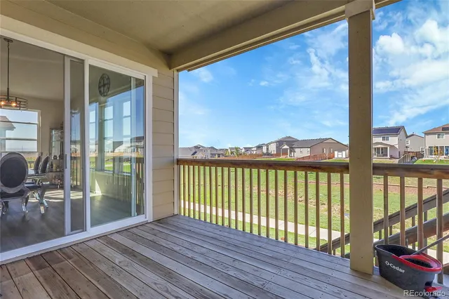 a view of a balcony with chair