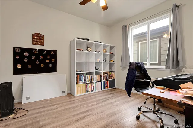 a workspace with a bookshelf