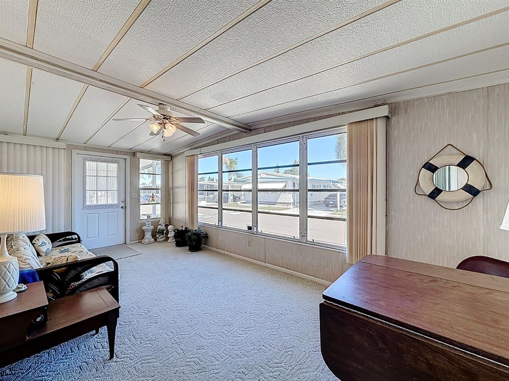 1100 South Belcher Road, Unit 561 Largo, FL 33771 - Photo 5 of 23 a room with furniture and a window