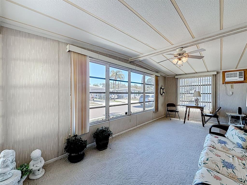 1100 South Belcher Road, Unit 561 Largo, FL 33771 - Photo 6 of 23 a room with furniture and a window