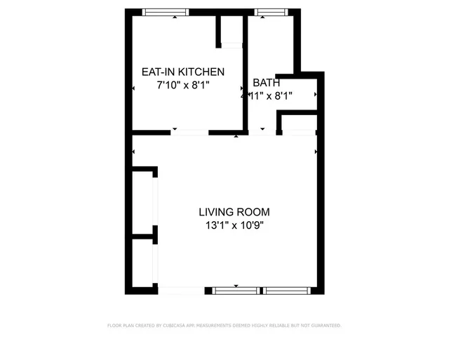 a picture of a bench in a white building