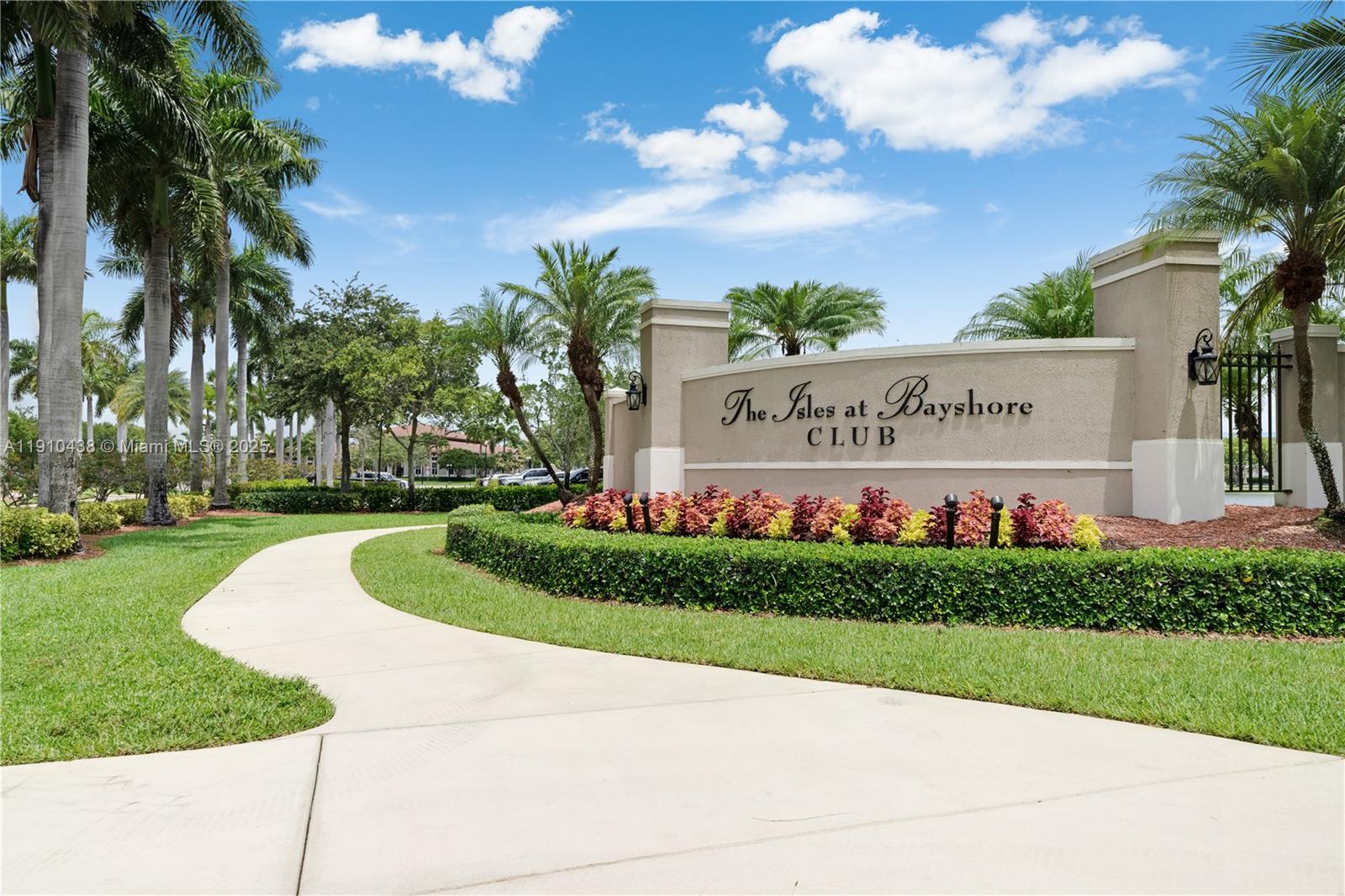 9239 Southwest 227th Street, Unit 4 Cutler Bay, FL 33190 - Photo 2 of 29 a sign on the side of the building