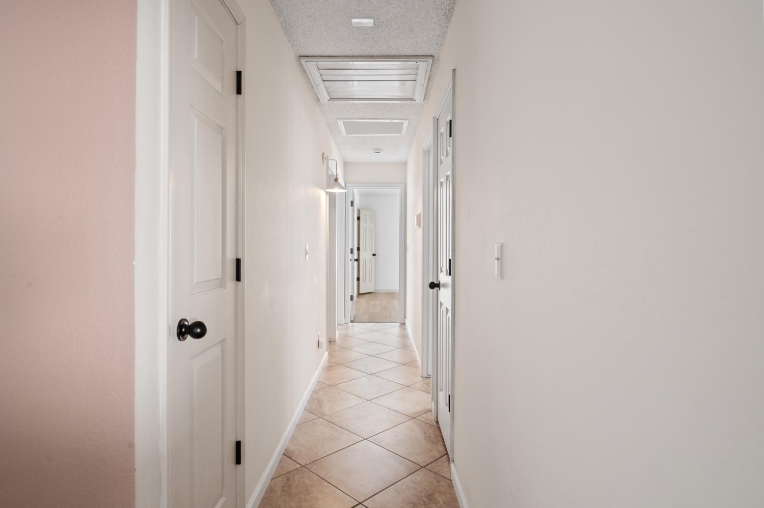38570 Rustic Lane Squaw Valley, CA 93675 - Photo 13 of 43 a view of a bathroom from a hallway