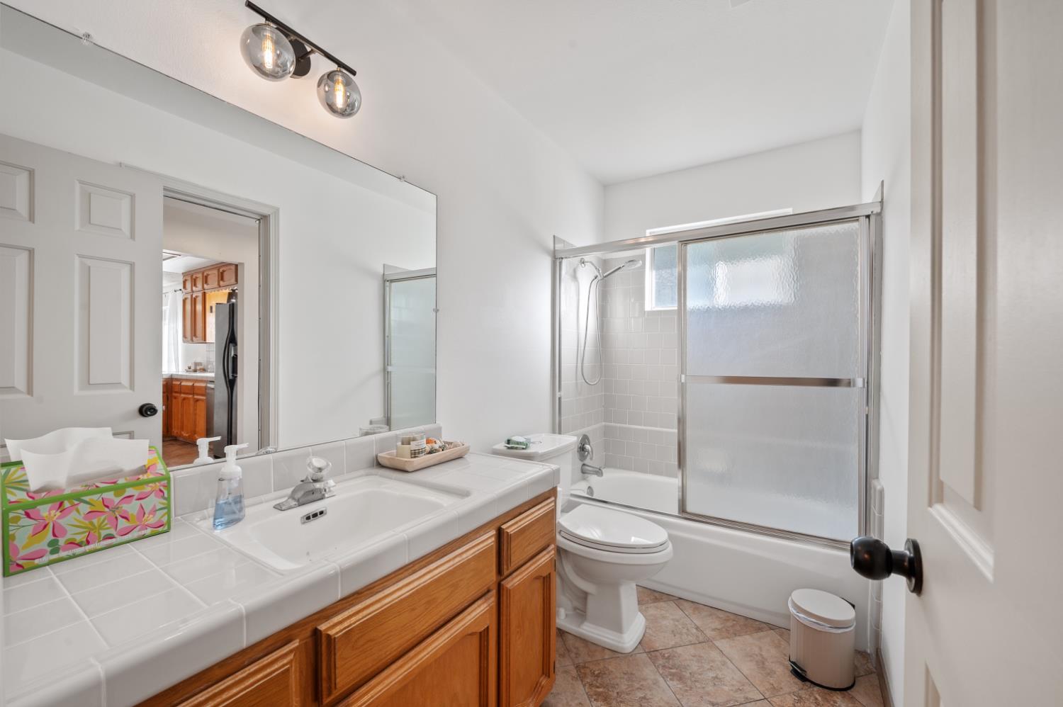 38570 Rustic Lane Squaw Valley, CA 93675 - Photo 14 of 43 a bathroom with a sink a toilet and shower