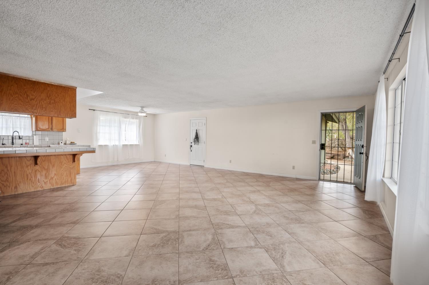 38570 Rustic Lane Squaw Valley, CA 93675 - Photo 7 of 43 a view of an empty room and window