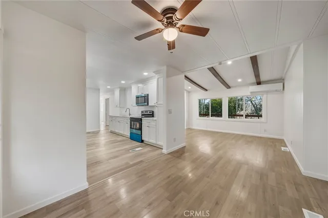 a view of a kitchen with a sink