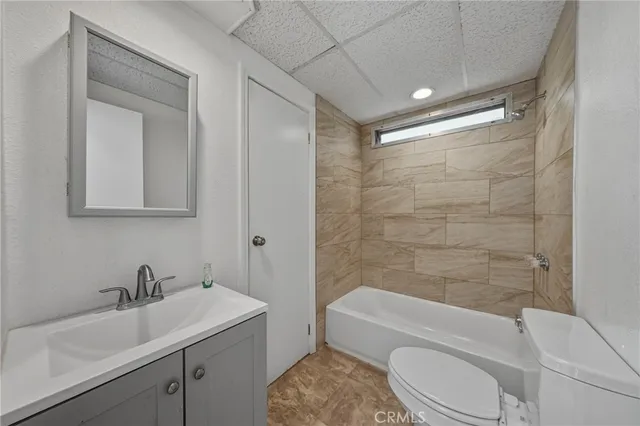 a view of walk in closet with wooden floor
