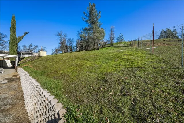 a top view of a house with a yard