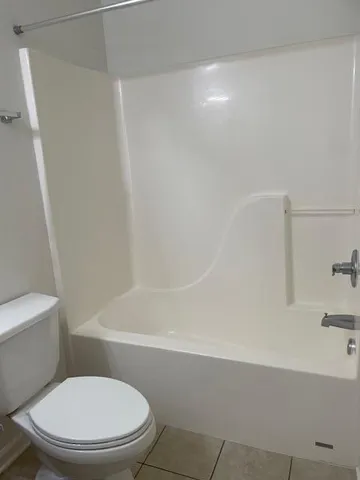 a bathroom with a sink vanity and a mirror