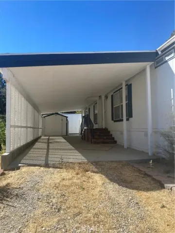 a house view with a backyard space