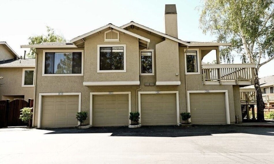 3885 Crow Canyon Road San Ramon, CA 94582 - Photo 1 of 1 a front view of a house with a balcony