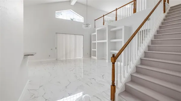 a bathroom with a toilet a sink and a mirror