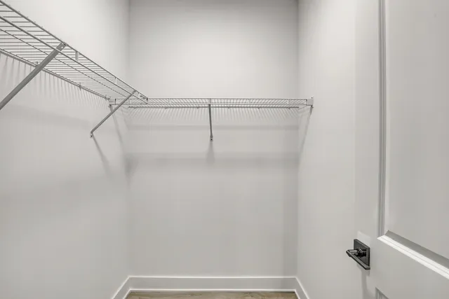 a view of small space with racks on the wall