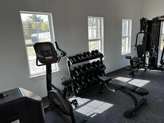 a view of a workspace with gym equipment