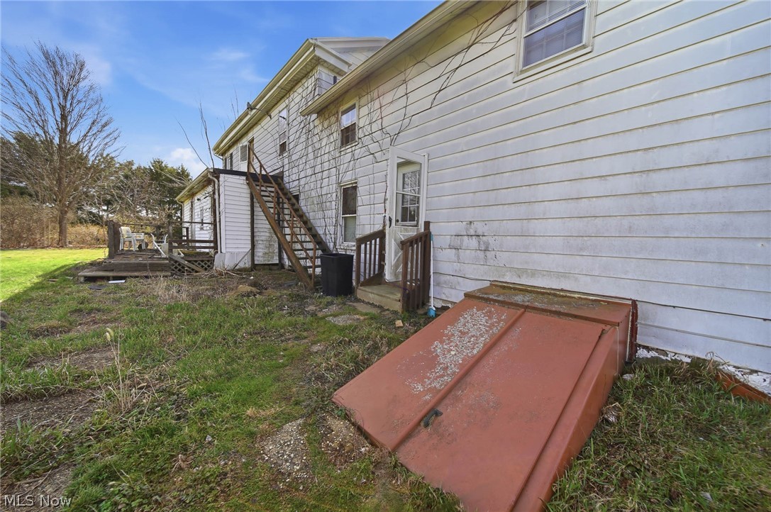 4677 Rock Spring Road Ravenna, OH 44266 - Photo 24 of 35 View of property exterior with a wooden deck