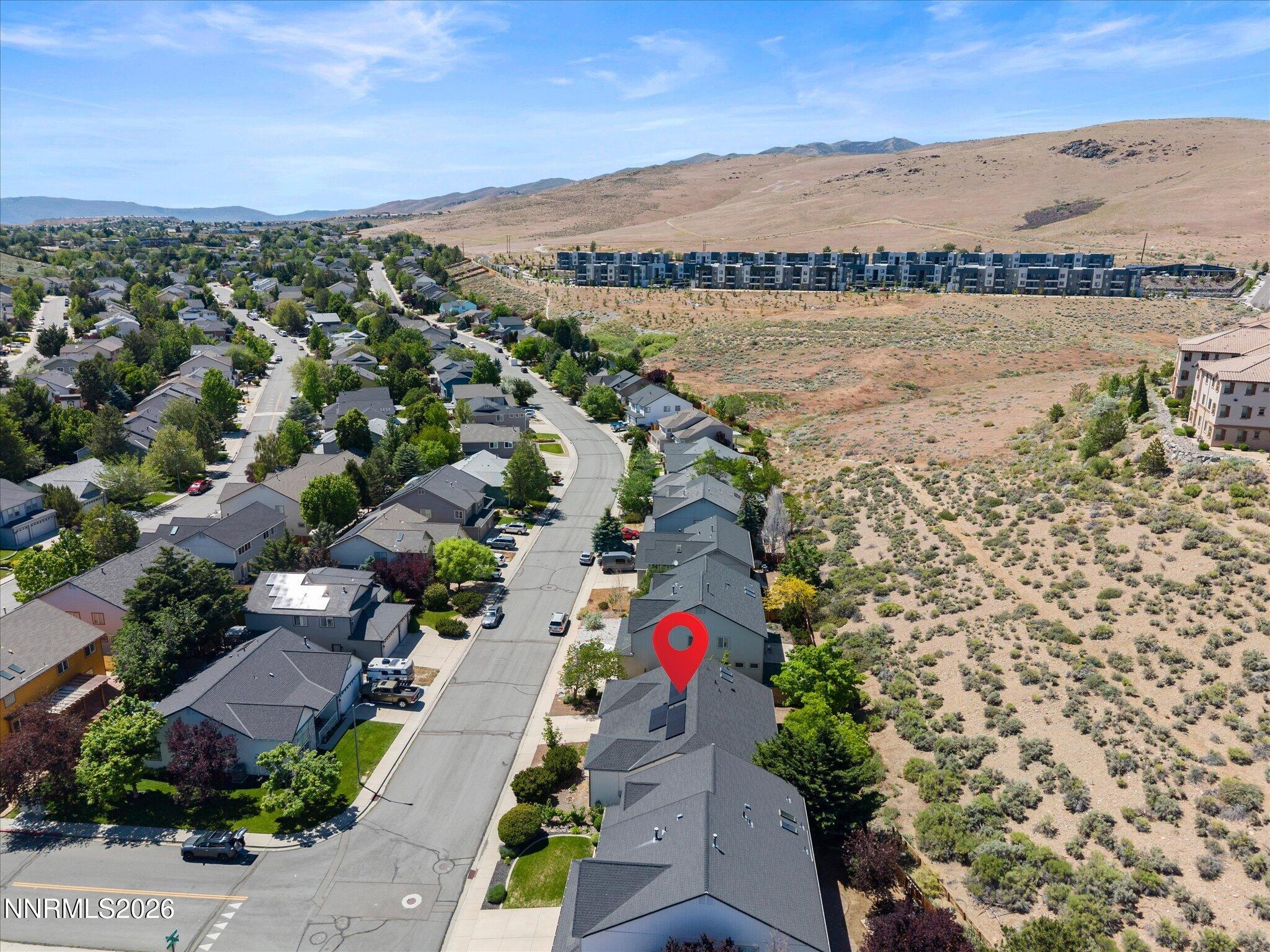 3101 Green River Drive Reno, NV 89503 - Photo 57 of 62 an aerial view of residential houses with outdoor space and river