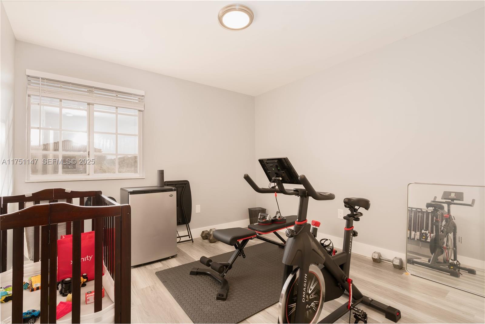 19444 Northwest 79th Court Hialeah, FL 33015 - Photo 21 of 26 a view of a workspace with furniture and a window