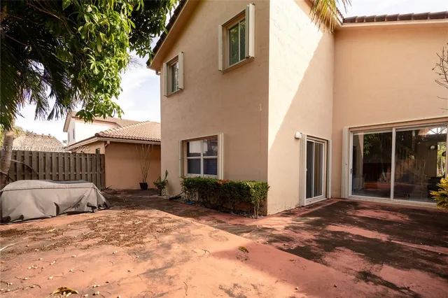 a backyard of a house with seating space