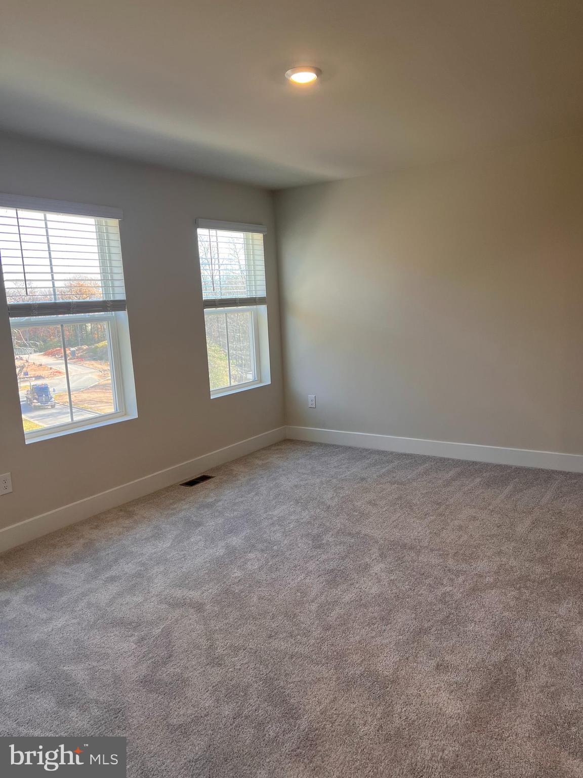 13927 Anderson Garden Road Laurel, MD 20707 - Photo 2 of 31 an empty room with windows