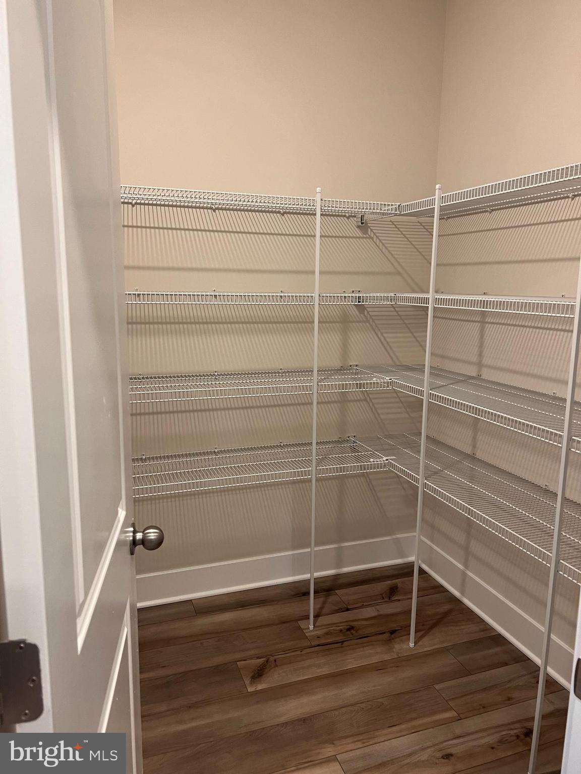 13927 Anderson Garden Road Laurel, MD 20707 - Photo 22 of 31 a view of a room with racks on the wall