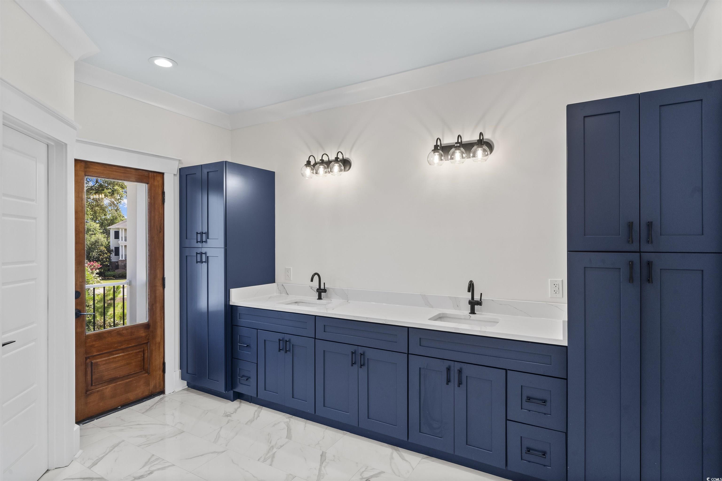 1017 Hyatt Pond Road North Myrtle Beach, SC 29582 - Photo 14 of 39 Full bathroom featuring marble look tiles, ornamental molding, double vanity, and recessed lighting