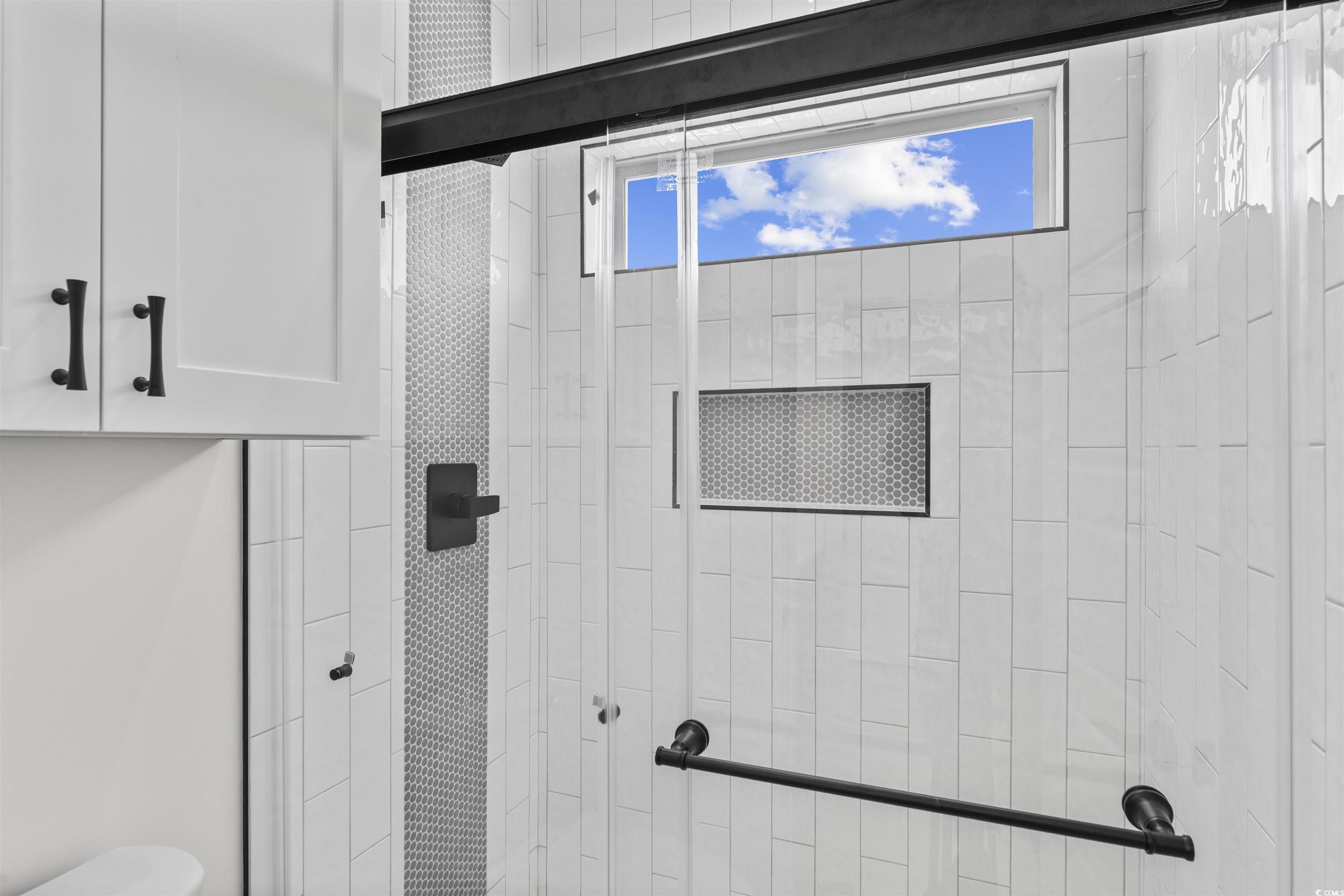 1017 Hyatt Pond Road North Myrtle Beach, SC 29582 - Photo 24 of 39 Bathroom with a tile shower