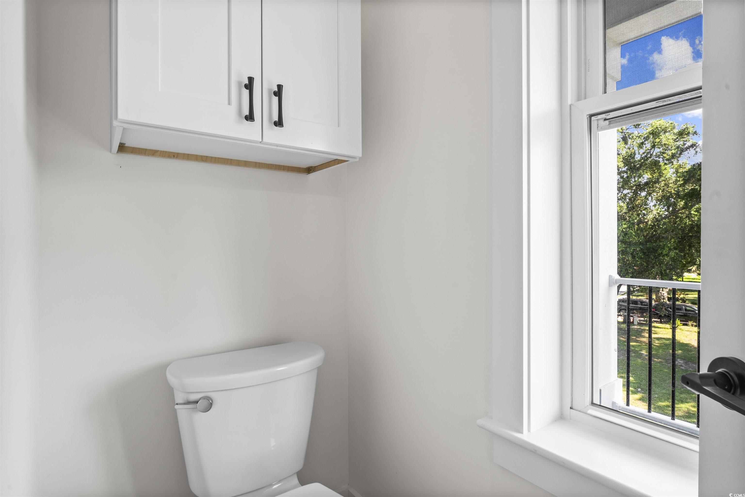 1017 Hyatt Pond Road North Myrtle Beach, SC 29582 - Photo 25 of 39 Half bathroom featuring plenty of natural light