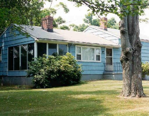 a view of a house with a garden