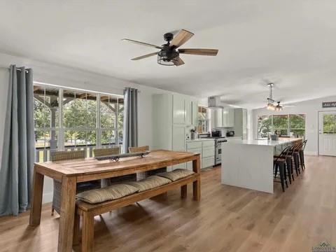 429 Private Road Big Sandy, TX 75755 - Photo 14 of 24 Dining area with ceiling fan and light wood-style floors