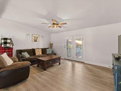 429 Private Road Big Sandy, TX 75755 - Photo 16 of 24 Living area featuring light wood-style flooring and a ceiling fan
