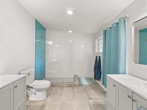429 Private Road Big Sandy, TX 75755 - Photo 19 of 24 Full bath featuring vanity and walk in shower