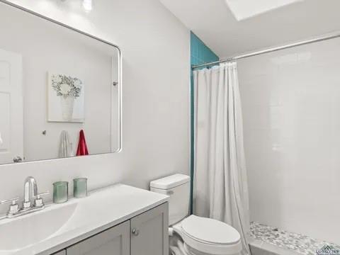 429 Private Road Big Sandy, TX 75755 - Photo 23 of 24 Bathroom featuring tiled shower and vanity
