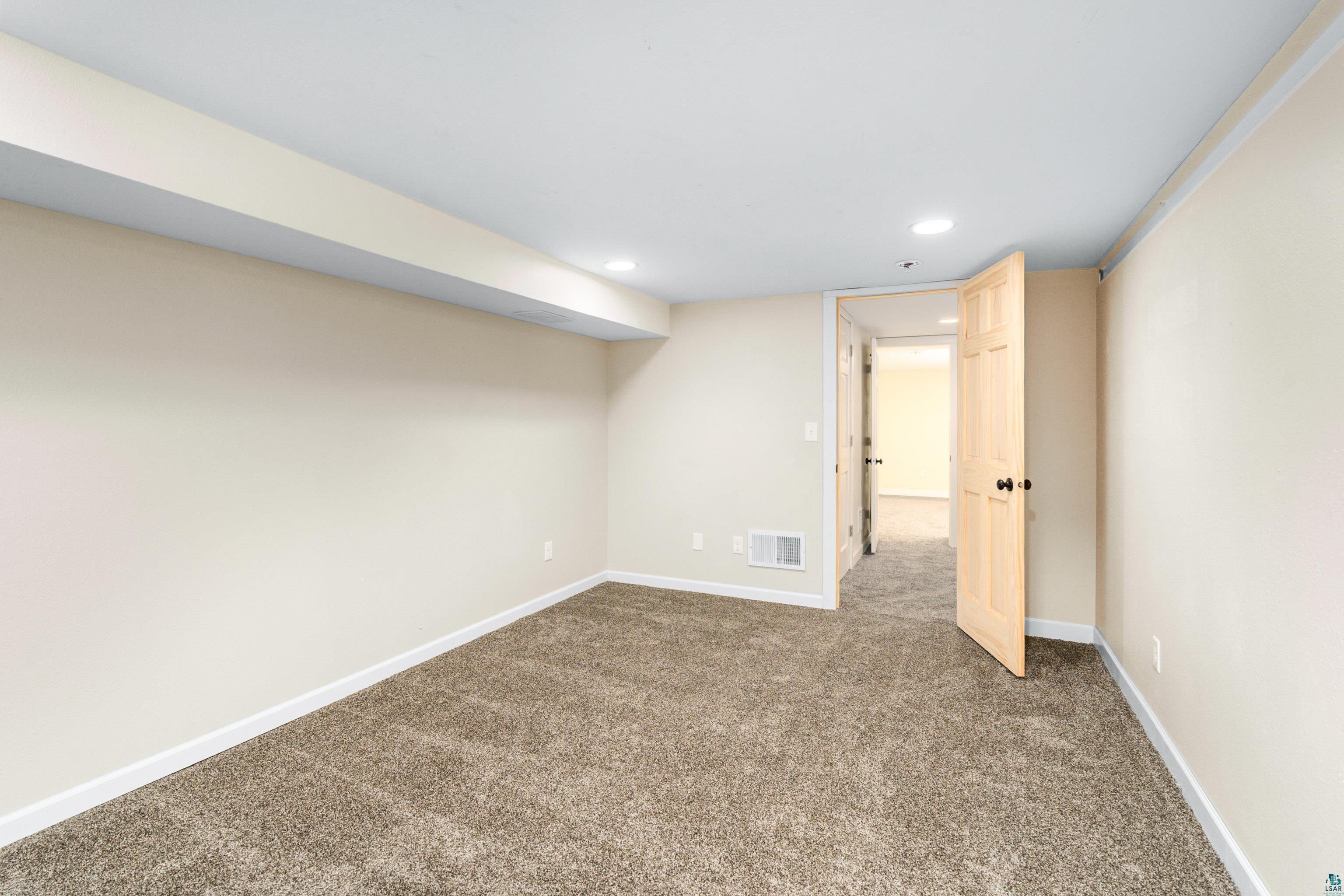 524 14th Avenue Two Harbors, MN 55616 - Photo 23 of 36 Finished basement featuring carpet and recessed lighting
