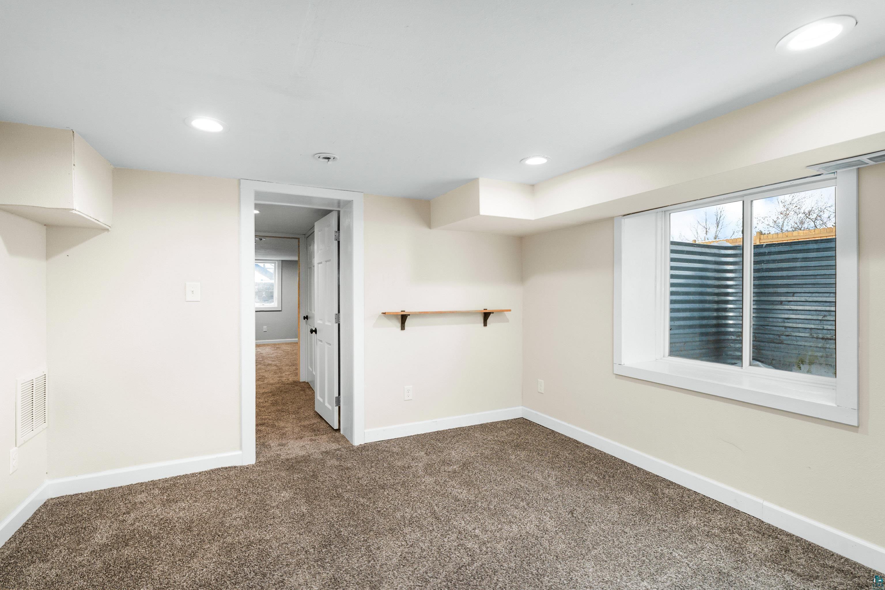 524 14th Avenue Two Harbors, MN 55616 - Photo 26 of 36 Basement with carpet flooring and recessed lighting