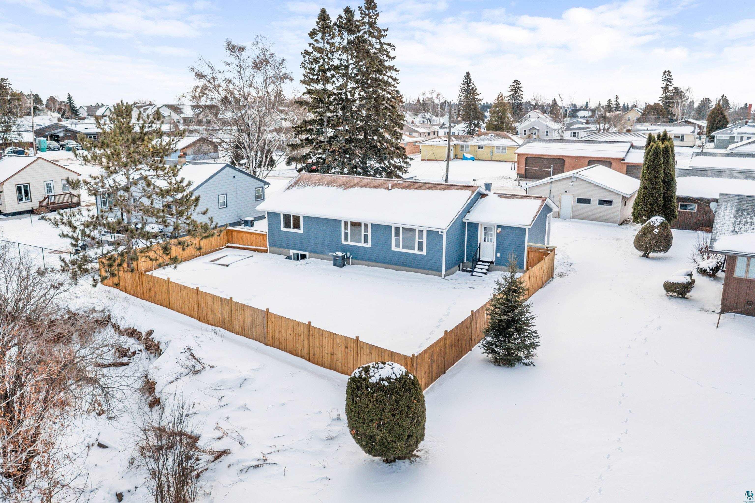 524 14th Avenue Two Harbors, MN 55616 - Photo 34 of 36 Snowy aerial view featuring a residential view