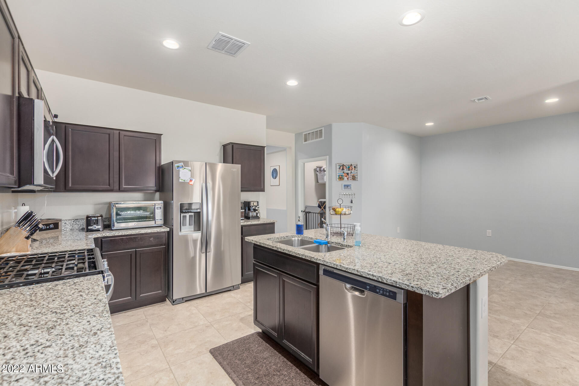 31011 West Osborn Road Buckeye, AZ 85396 - Photo 8 of 26 Island overlooking dining area