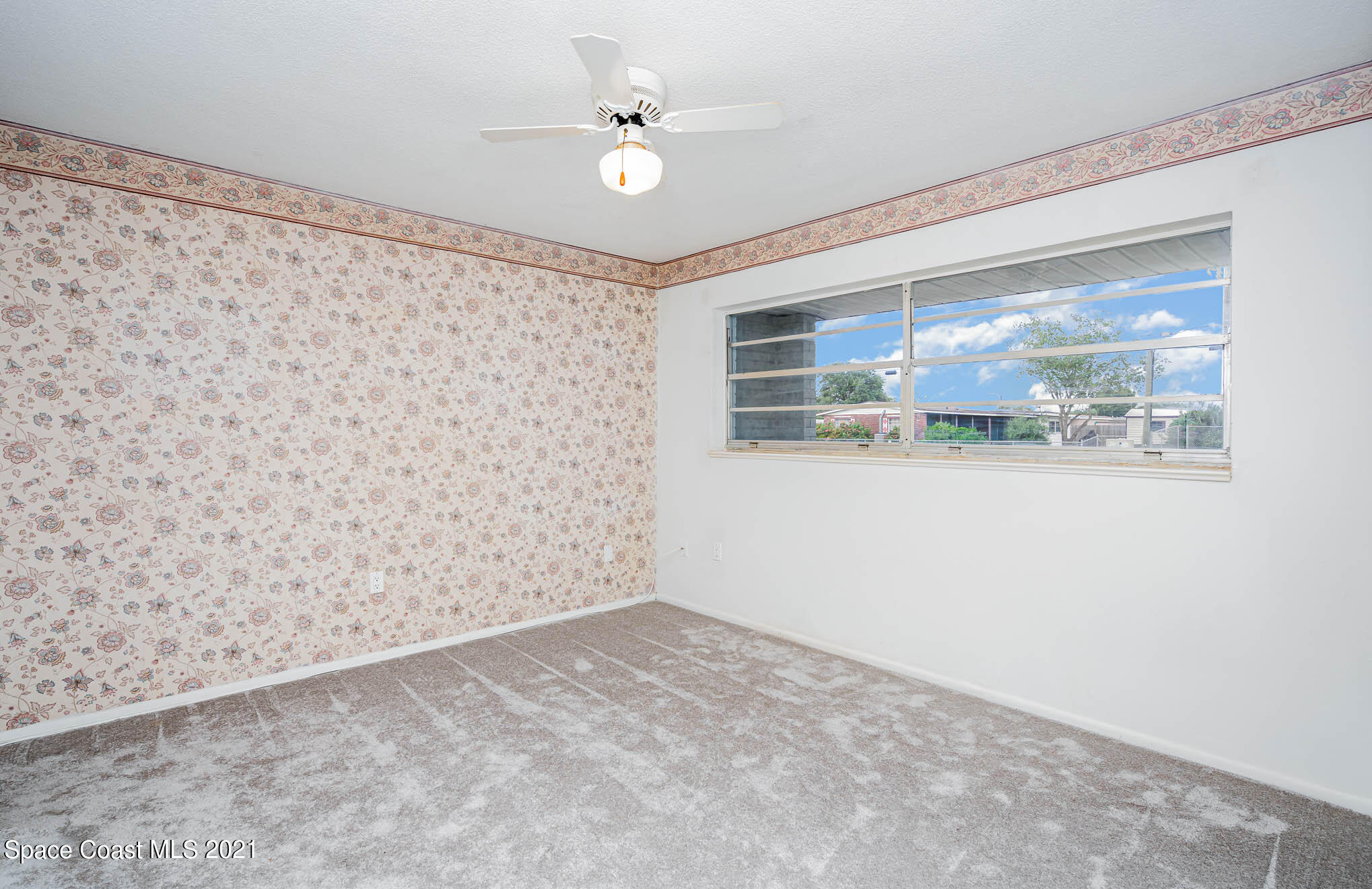 2127 Fatzler Road Melbourne, FL 32935 - Photo 13 of 21 a view of an empty room