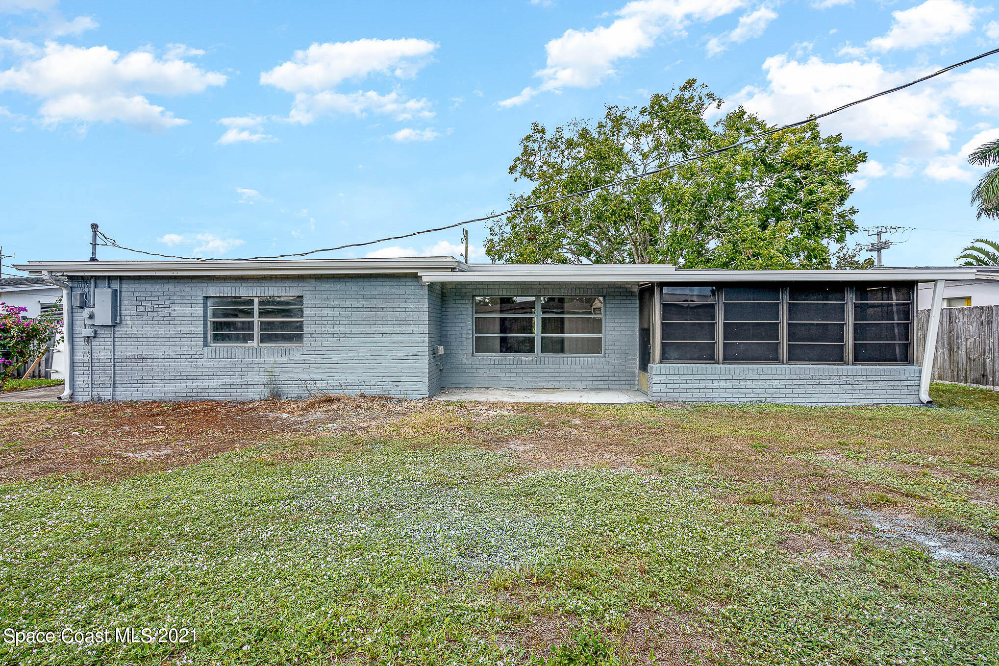 2127 Fatzler Road Melbourne, FL 32935 - Photo 20 of 21 a house view with a backyard space