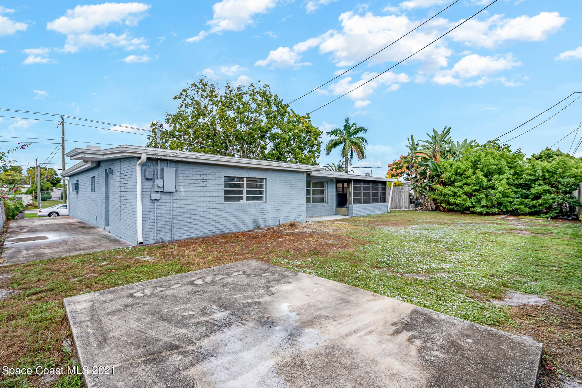 2127 Fatzler Road Melbourne, FL 32935 - Photo 21 of 21 a view of a yard with a house