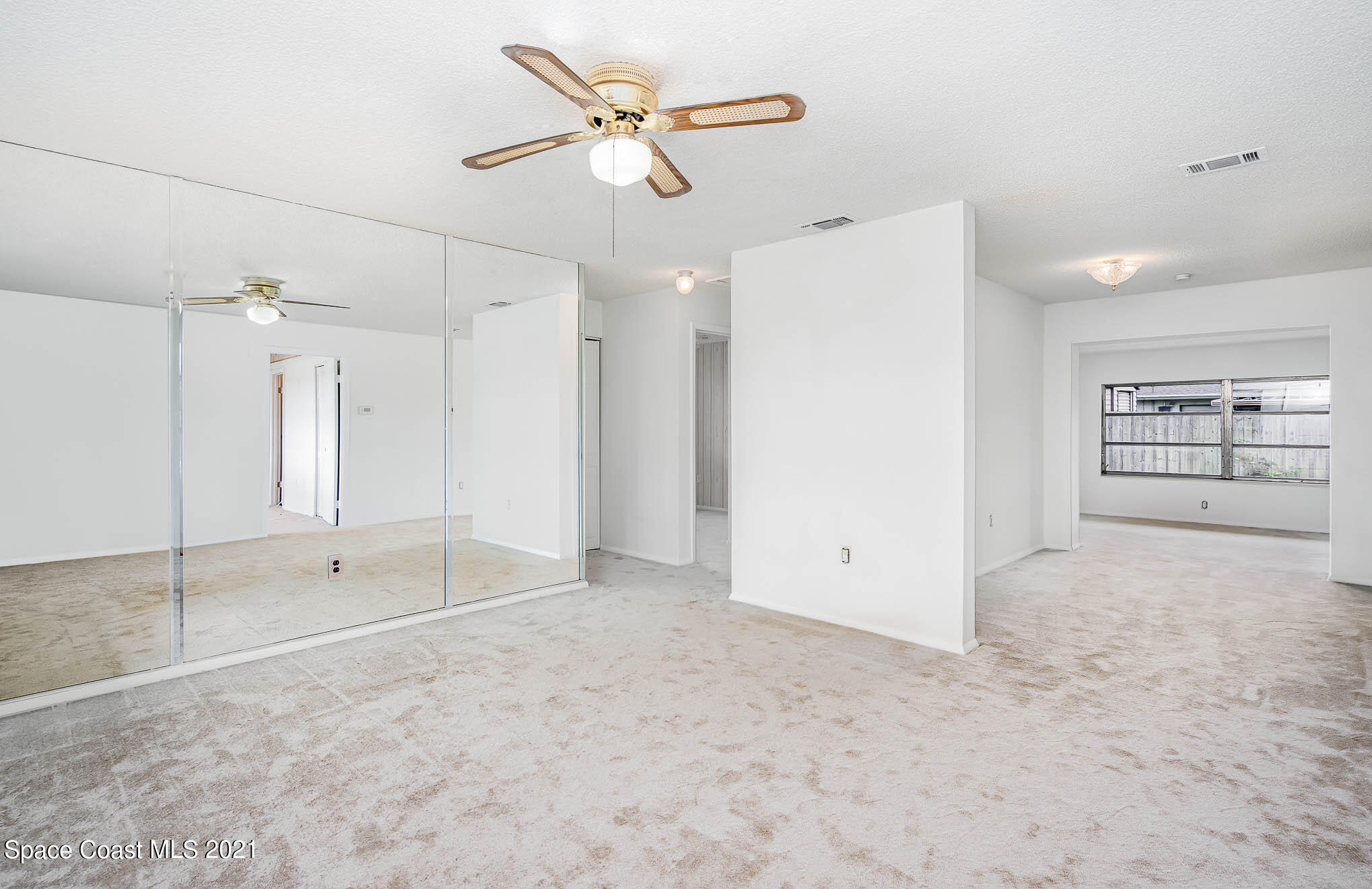 2127 Fatzler Road Melbourne, FL 32935 - Photo 4 of 21 a view of an empty room