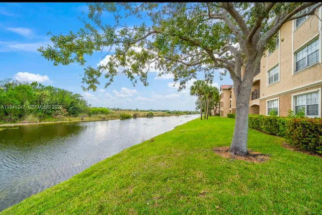a view of a garden with a lake