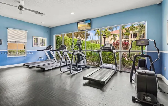 a view of a room with gym equipment
