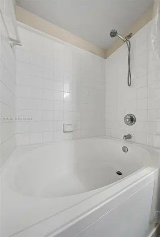 a bathroom with a bathtub