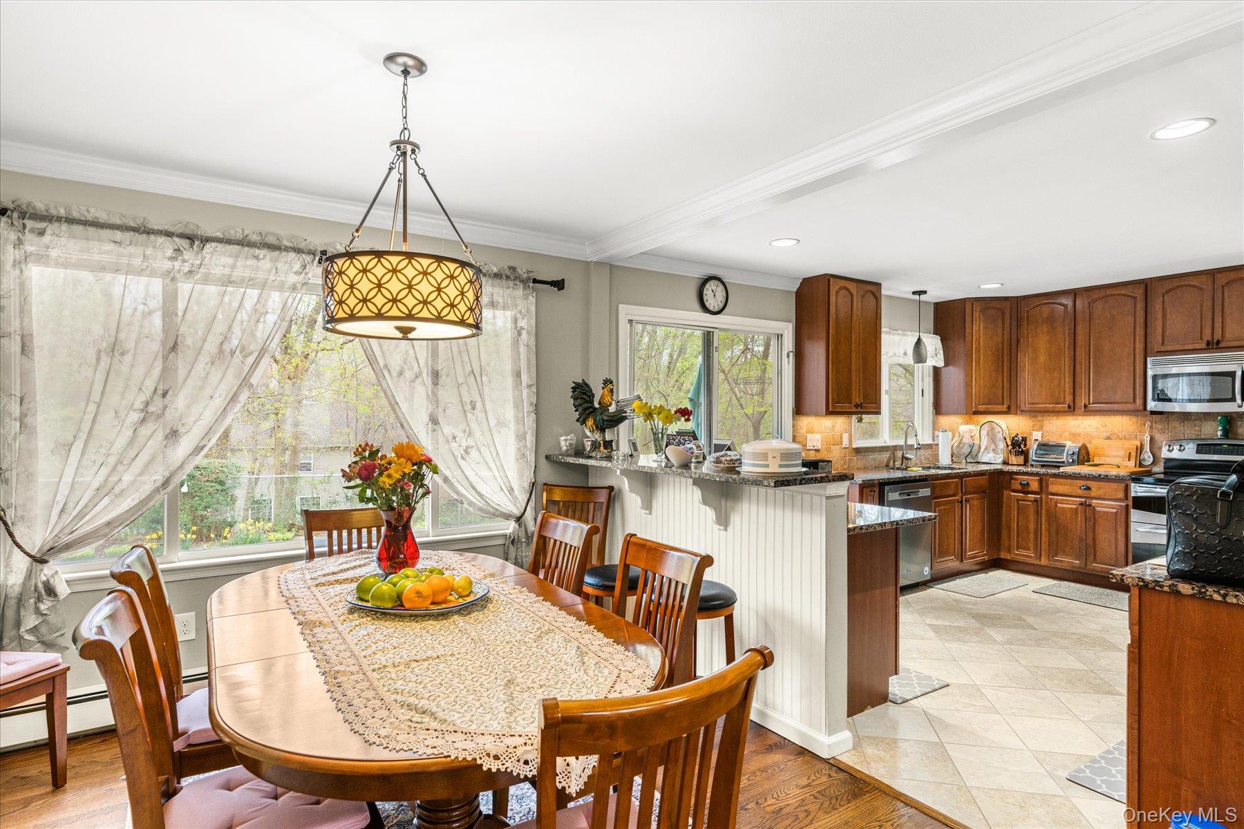 6 George Court Miller Place, NY 11764 - Photo 5 of 33 a view of a dining room and livingroom view