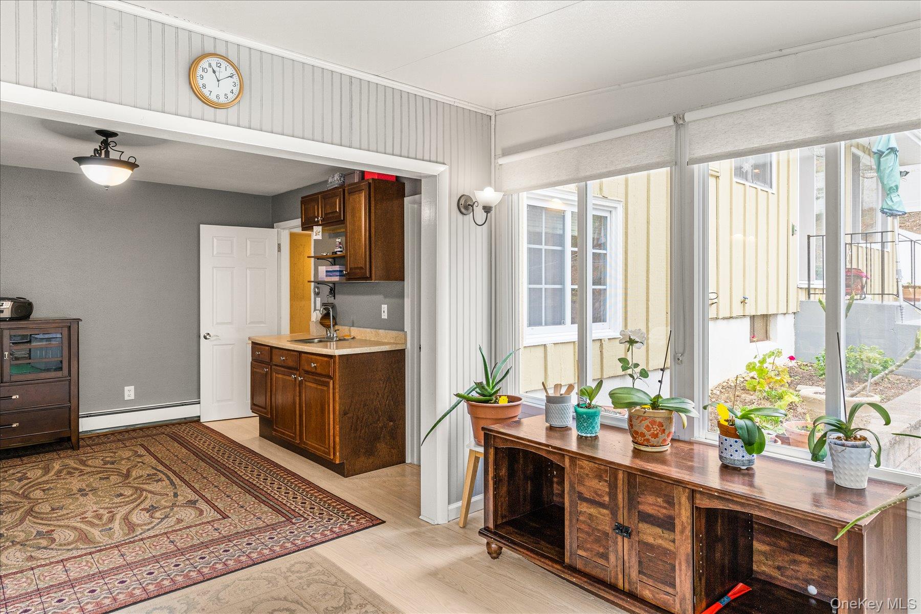 6 George Court Miller Place, NY 11764 - Photo 9 of 33 a room with furniture and window