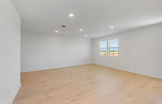 a kitchen that has a sink and a stove in it