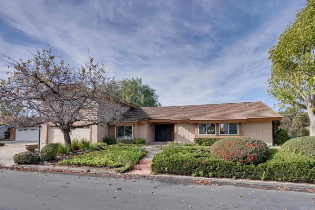 757 Rocking Horse Road Vista, CA 92081 - Photo 1 of 1 front view of a house with a garden